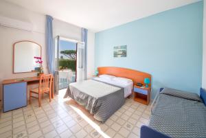 Postel nebo postele na pokoji v ubytování Hotel Costa Citara + 37 fotografií