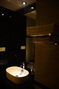 Phòng tắm tại Bottomhill Palace Hotel