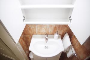 Koupelna v ubytování Apartment Centar