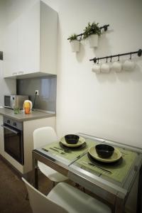 Kuchyň nebo kuchyňský kout v ubytování Apartment Centar