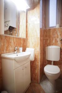 Koupelna v ubytování Apartment Centar