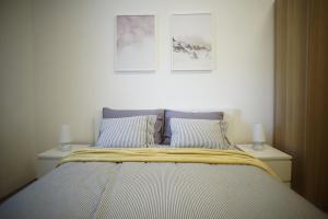 Postel nebo postele na pokoji v ubytování Apartment Centar