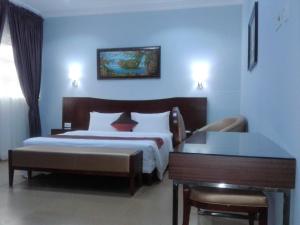 Voodi või voodid majutusasutuse Conference Hotel & Suites Ijebu toas