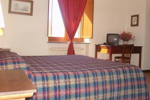 TV a/nebo společenská místnost v ubytování Agriturismo Cioccoleta