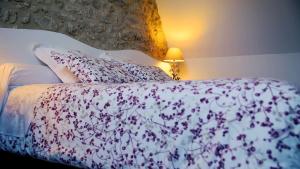 Cama o camas de una habitación en Les Camelias