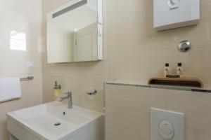 Kúpeľňa v ubytovaní Apartments Villa Victoria + 27 fotografií