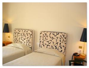 Krevet ili kreveti u jedinici u okviru objekta Hotel Certosa
