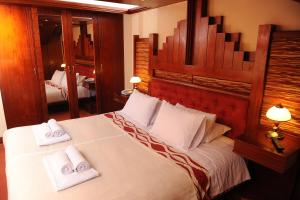 Letto o letti in una camera di Hotel Waynapicchu