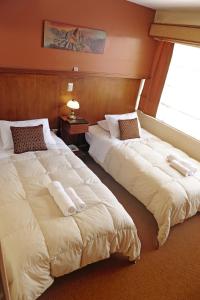 Letto o letti in una camera di Hotel Waynapicchu