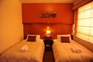 Letto o letti in una camera di Hotel Waynapicchu