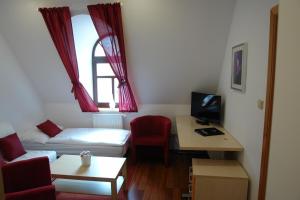 TV a/nebo společenská místnost v ubytování Hotel Střelnice