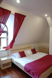 Postel nebo postele na pokoji v ubytování Hotel Střelnice