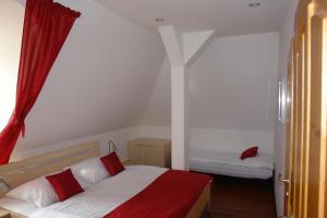 Postel nebo postele na pokoji v ubytování Hotel Střelnice