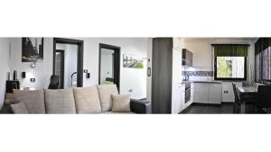 Kuchyň nebo kuchyňský kout v ubytování Apartma Auriga