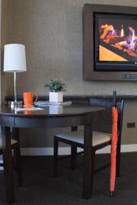 TV a/nebo společenská místnost v ubytování Hotel Arista