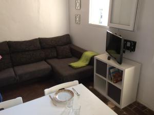 A seating area at Cal Mestre - Apartament 4 pax. 1er pis
