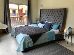 Letto o letti in una camera di Palapa Beach Resort Curacao