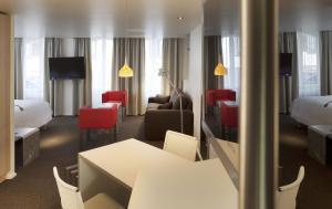 Posezení v ubytování Hotel Le Pavillon 7