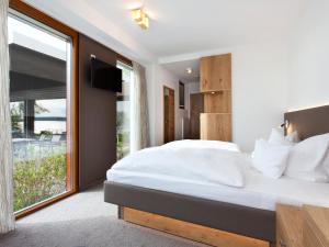 Postel nebo postele na pokoji v ubytování Hotel Restaurant Seehalde + 37 fotografií