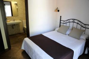 Кровать или кровати в номере Arcos de Montemar