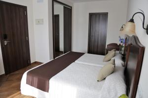 Кровать или кровати в номере Arcos de Montemar