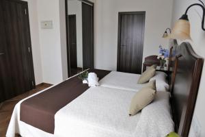 Кровать или кровати в номере Arcos de Montemar