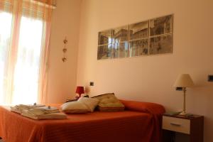 Posteľ alebo postele v izbe v ubytovaní La casa di Federica, at home