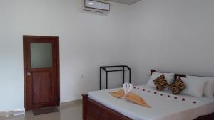 Letto o letti in una camera di Nature Lodge