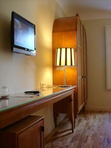 TV a/nebo společenská místnost v ubytování Hotel Certosa