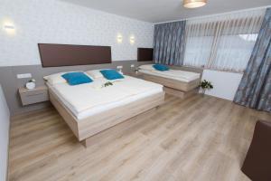 Postel nebo postele na pokoji v ubytování Appartments Gartenblick