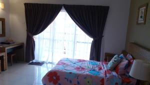 Billede fra billedgalleriet på ZamLan Gold Coast Morib Intl Resort - Studio i Banting