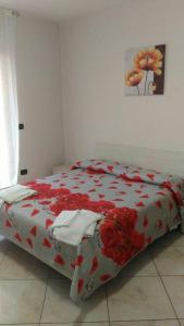 Postel nebo postele na pokoji v ubytování SWEET HOME GIULIA Locazione ad uso turistico
