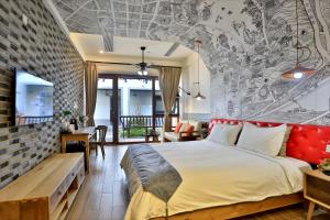 Youxiake Canal Hotel Hangzhou客房内的一张或多张床位