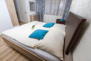 Postel nebo postele na pokoji v ubytování Appartments Gartenblick