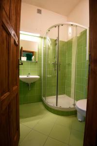 Ванная комната в Giotto Apartments