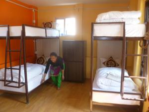 Postel nebo postele na pokoji v ubytování Andes House