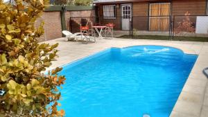 Bazén v ubytování Departamentos Lugar de Descanso nebo v jeho okolí