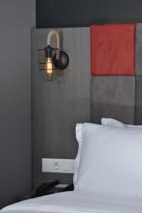 Postel nebo postele na pokoji v ubytování A11 Hotel