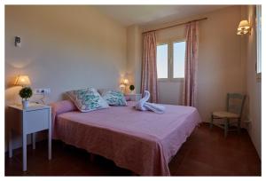 Ein Bett oder Betten in einem Zimmer der Unterkunft Ca Ses Nines
