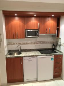 Kuchyň nebo kuchyňský kout v ubytování Apartamento en Calpe, playa de La Fossa, primera línea, AA