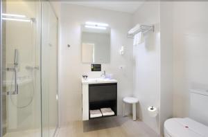 Koupelna v ubytování Hotel Alameda