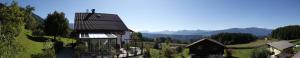 an aerial view of a house on a hill at Landhaus Palle in Millstatt