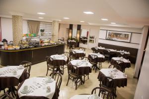 Restaurace v ubytování Dois Vizinhos Palace Hotel