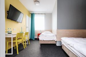 Postel nebo postele na pokoji v ubytování Tamada