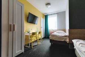Postel nebo postele na pokoji v ubytování Tamada