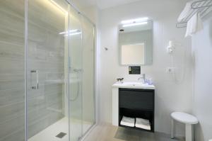 Koupelna v ubytování Hotel Alameda