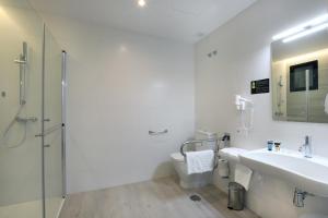 Koupelna v ubytování Hotel Alameda