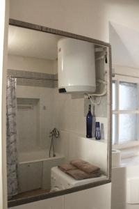 Ένα μπάνιο στο Mini Home Vilnius Old Town