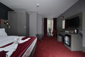 Postel nebo postele na pokoji v ubytování A11 Hotel