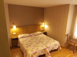 Postel nebo postele na pokoji v ubytování Hostal Orejas